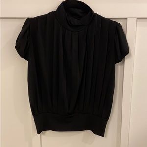 High neck, snatched waist, puff sleeve, keyhole